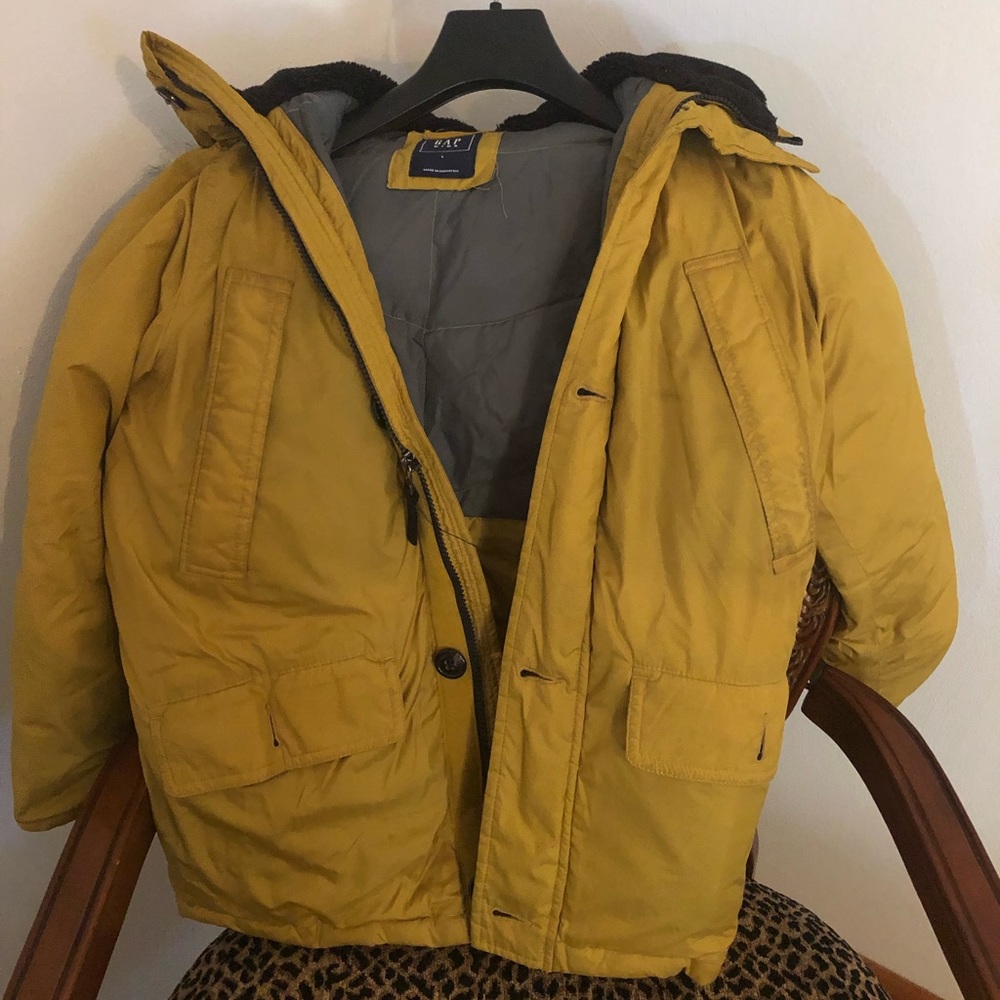 Gap boys gently used parka coat with faux fur hood.  Size L.  Mustard yellow.